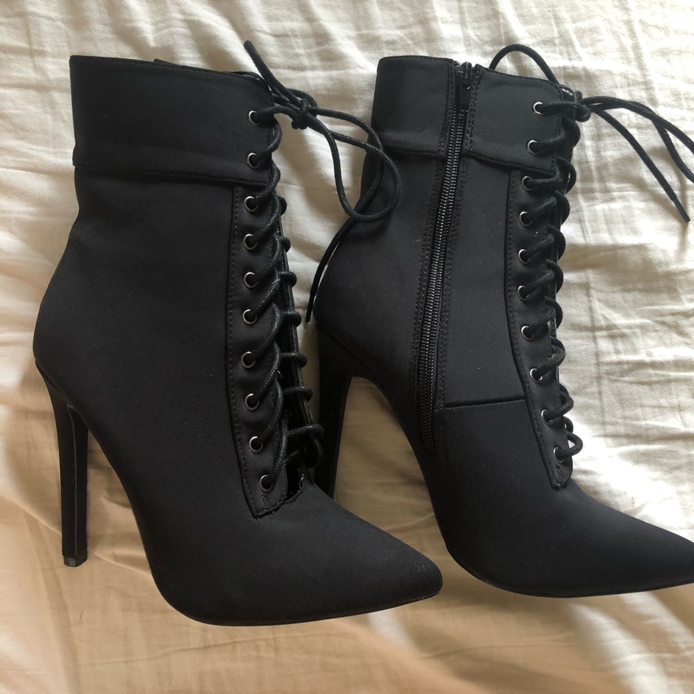 Miss Lola High heeled boots